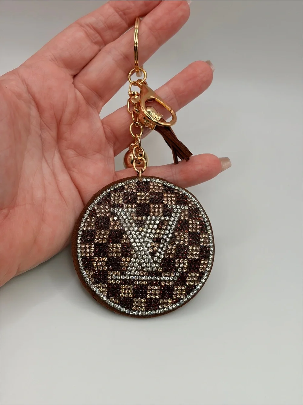 Crystal-Embellished Round Keychain Charm in Brown and Gold